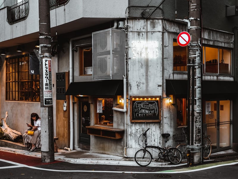 Traveler looking at a map in Japan